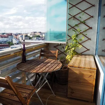 Sunset Views Over Rooftops Apartment